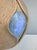 This hand-sized ceramic vase impresses with its sculptural presence and a substantial diameter of approximately 23 cm. The...