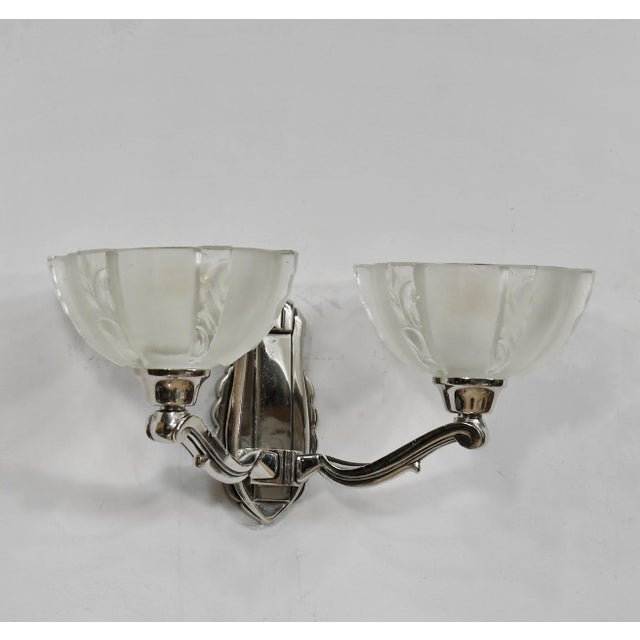 EZAN - Jean Gauthier A nice pair of French art deco double wall sconces in nickel plated copper alloy (bronze or solid...