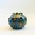 A mid century studio pottery vase. Beautiful blue and green glaze with a cutout pattern around the top. Signed "Monterey...