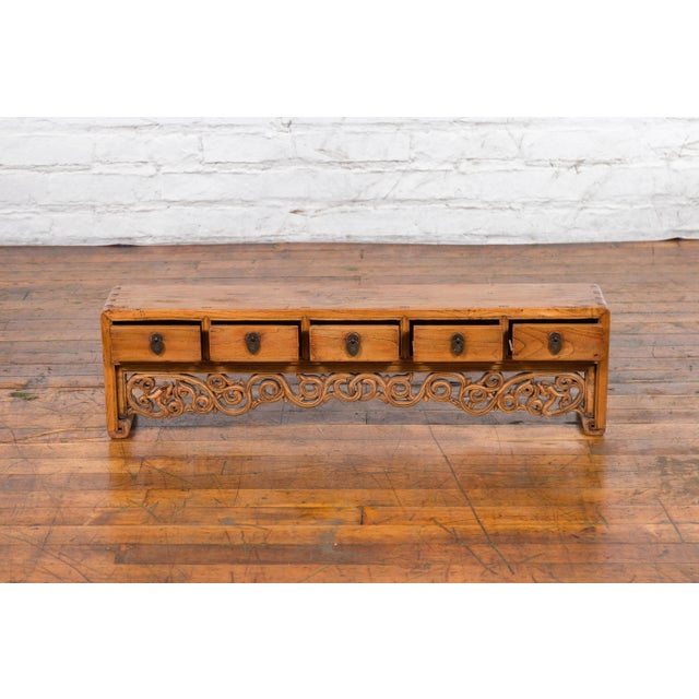 Asian Chinese Qing Dynasty 19th Century Low Kang Cabinet with Carved Scrolling Apron For Sale - Image 3 of 13