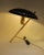 This iconic “Decora” table or desk lamp, also often called Model Z, was designed in 1956 by the famous architect and...