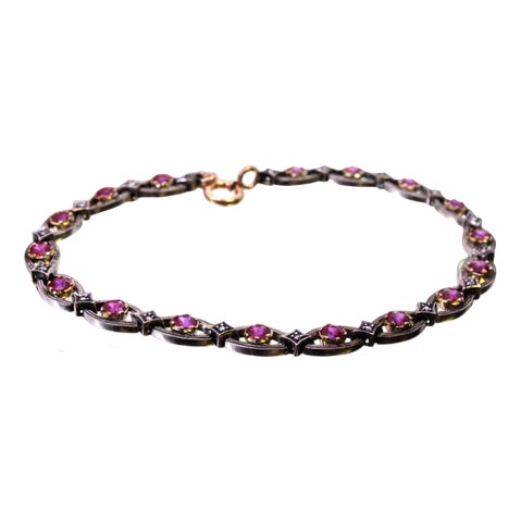 Gold and Silver Bracelet with Calibrated Synthetic Rubies For Sale