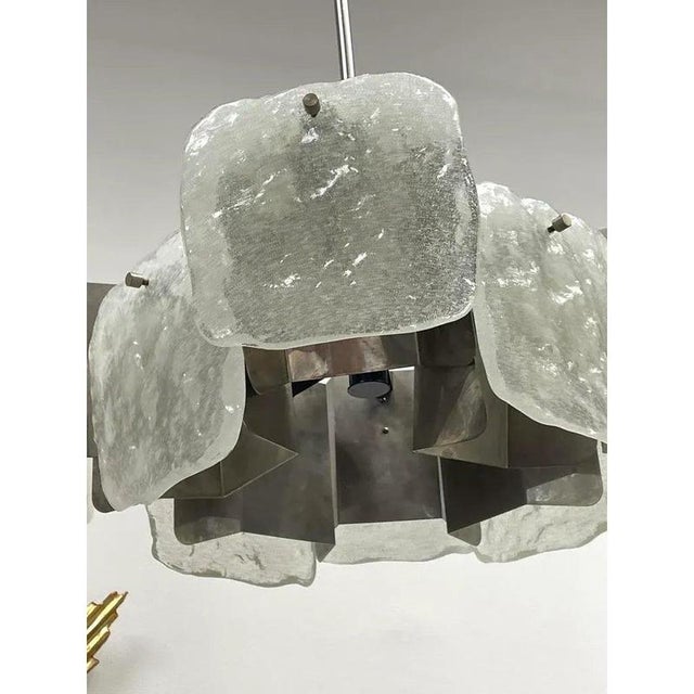 Eight-arm black lacquered and opaline ice glass chandelier, 1960s Mid-Century Modern chandelier made in the 1960s. It has...