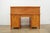 Vintage oak rolltop desk featuring a warm honey-toned finish, classic tambour front, and beautifully detailed wood grain...