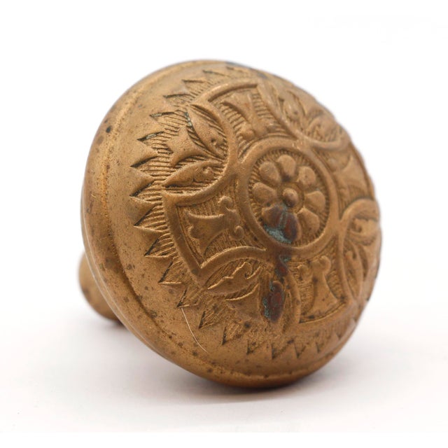 This Vernacular style four fold stamped bronze door knob was made by Sargent in the 1890 catalog. It is part of H-26100...