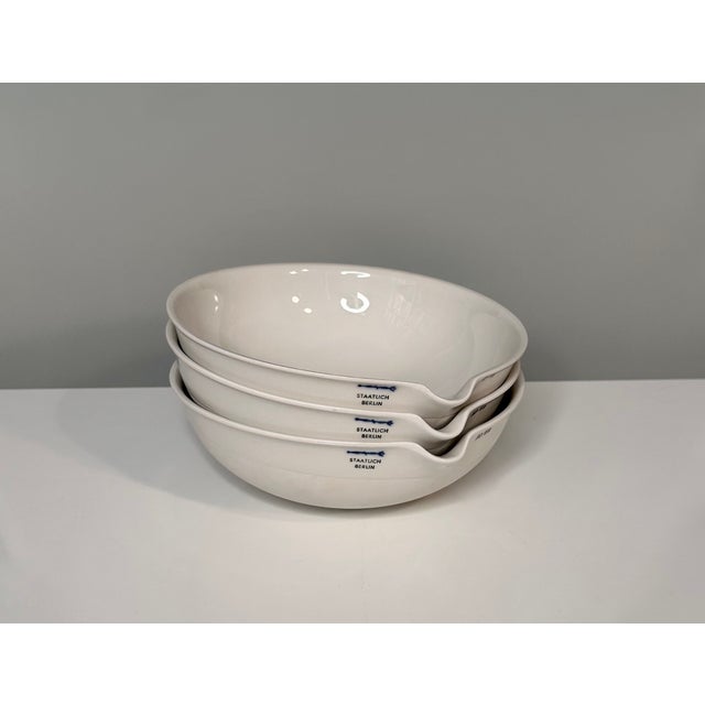 This set of original 'lab' porcelain bowls was manufactured by kpm berlin (staatlich berlin), dating from the interwar...