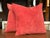 A pair of new custom square pillows exclusively made for Cafiero Select. The fabric is a velvety coral orange corduroy...