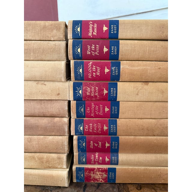 Tan Mid-Century Set of 27 (Twenty Seven) Zane Grey Books Vintage Western Collection Tan Cloth Binding Red Blue Spine For Sale - Image 8 of 12