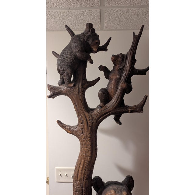 This antique carved wooden bear umbrella and hat stand is a remarkable and highly collectible piece. Its most distinctive...