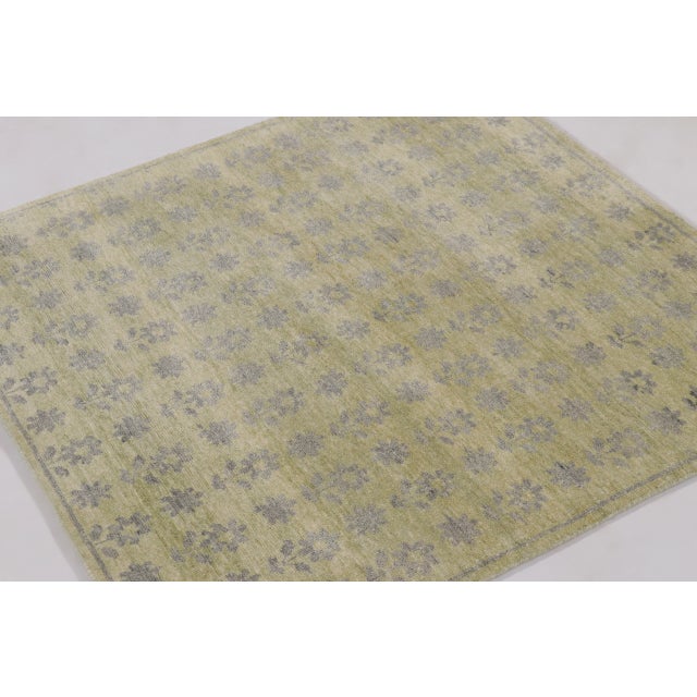 This 4 x 4 contemporary block print square rug from India blends refined craftsmanship with a soft decorative aesthetic....