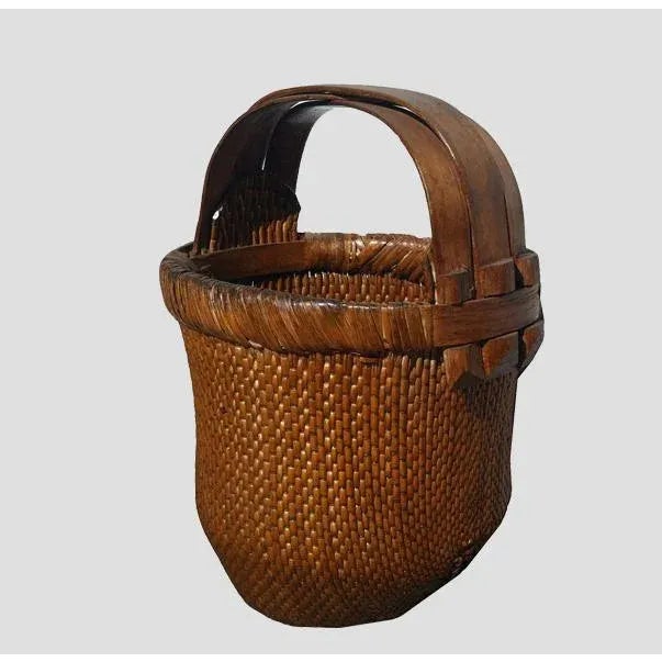 In well-aged brown color with 3 bent handles, this beautifully hand woven basket was used to carry fresh vegetables from...