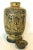 Covered vase in cracked earthenware Decorated with figures on horseback Black wooden base Small chips on the cabochon (see...