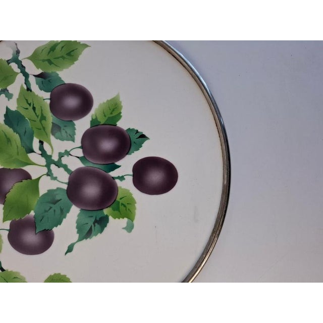 This Art Deco porcelain tray was produced in Czechoslovakia in the 1930s. The design features a stylized plum motif with...