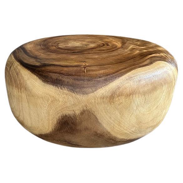 Impressive contrasting tones on this reclaimed single root suar wood coffee table. Hand carved into a stunning drum shape...