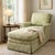 A very comfortable custom upholstered chaise lounge featuring classic rolled arms and a tailored skirted base. The...