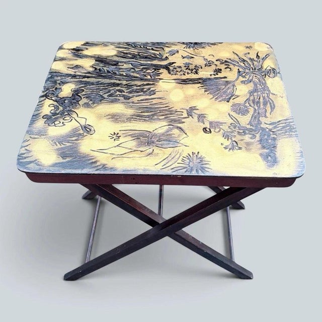 a decorative antique japanese folding occasional table with chinoiserie styling and a dark lacquered finish. Its compact...