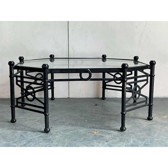 Anchor your living space with this striking vintage octagonal coffee table. A fantastic example of Hollywood Regency...