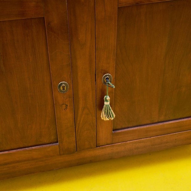 This solid wood sideboard is an impeccable example of elegance and functionality. With its clean lines and classic design,...