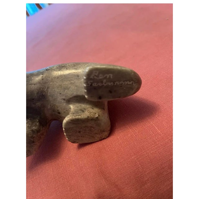This items is from my collection of fine art created by Alaskan artists. This items was carved by: BEN SACLAMANA KING...