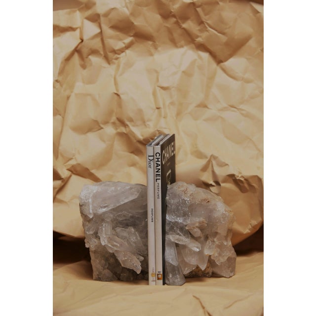 Ivory calcite crystal bookends. Due to the natural handcrafted materials used, variation in size, shape, and color should...