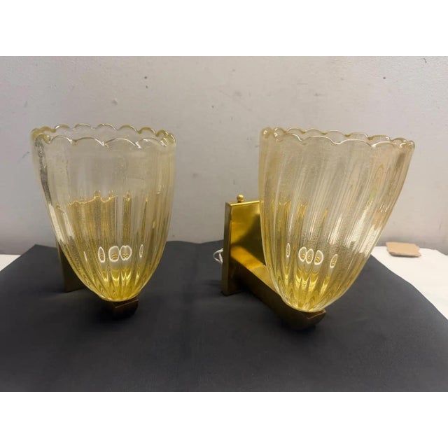 This set of two wall sconces is a stunning example of Barovier-style Mid-Century Modern design from the 1990s. Strongly...