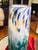 Tall, thin studio art glass hand blown vase is a colorful collaborative between artists glass blowers Faro and Powers....