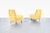This striking pair of mid-century modern lounge chairs was manufactured in the United States during the 1960s and...