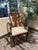 Graceful lines, rich mahogany tones, and timeless craftsmanship define this elegant armchair by Universal Furniture Ltd....