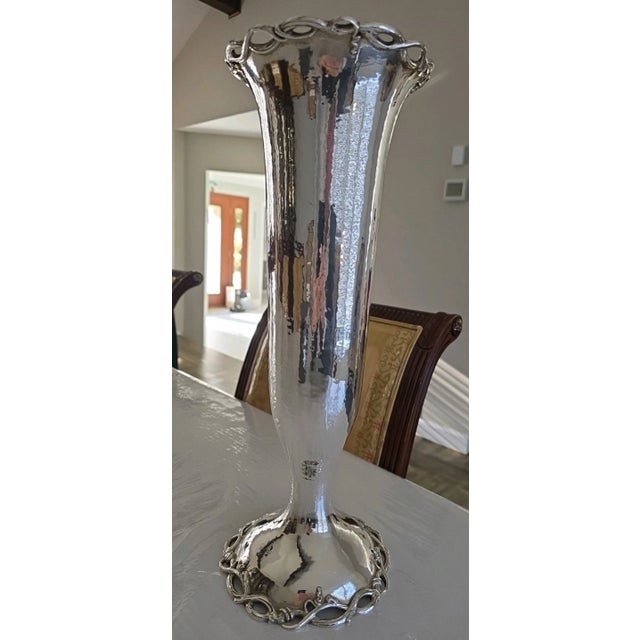 A monumental and exceptionally rare antique Gorham hand-hammered Arts & Crafts sterling silver vase, dated circa 1909....