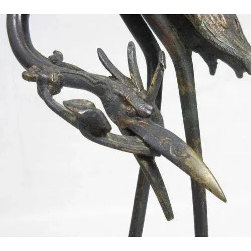 Antique Japanese bronze shokudai (candle stick for a Buddhist shrine) in the form of a crane standing on a turtle's back....