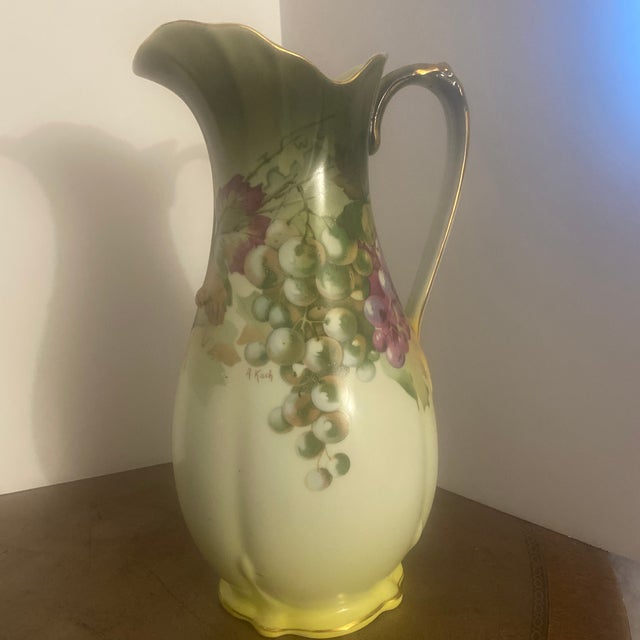 This is a three piece set of vintage Andrea by Sadek porcelain pieces, specifically an ice bucket or cache pot, a covered...