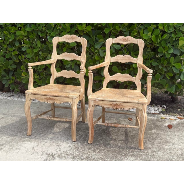 Vintage Louis XV-style carved accent chairs featuring beautifully shaped backs, carved floral details, curved cabriole...