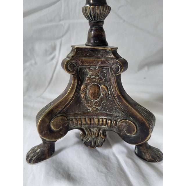 This exceptional pair of late 19th-century church altar pricket candlesticks beautifully balances historical liturgical...