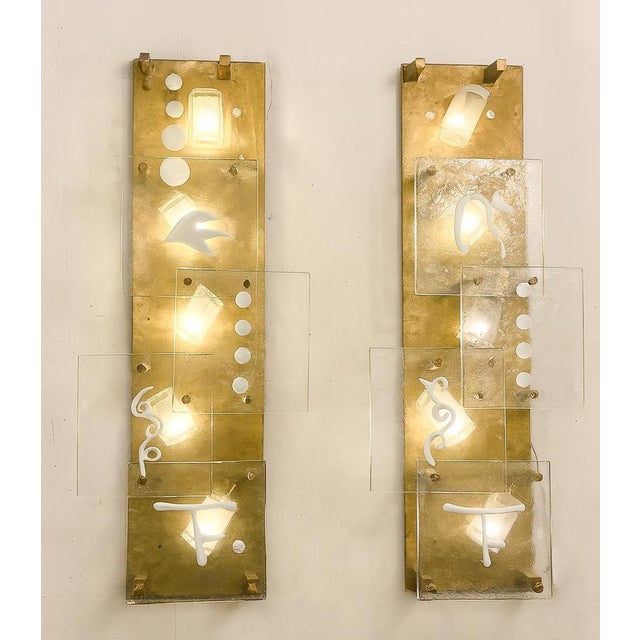 Mid-Century Modern Pair of Wall Lights, Glass and Brass, Italy Up to 250V (Europe/UK Standard).The wiring of this item may...