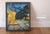 Gorgeous vibrant vintage painting featuring a very lively and starry night scene with a brightly lit cafe as a focal point...
