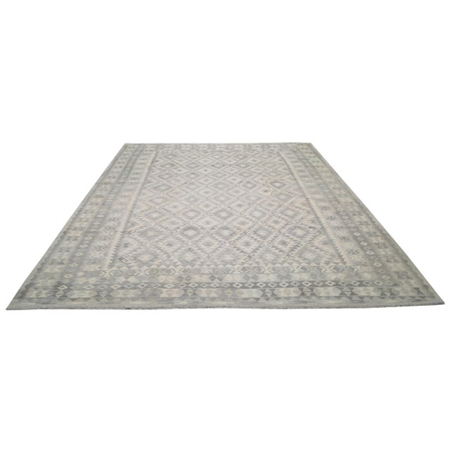 Moroccan Beni Ourain hand knotted rug with natural colors, contemporary style and soft texture.