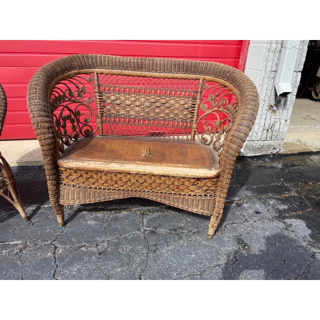 Victorian Wicker Settee and matching chair. Some weak spots/breaks in filigree. Settee bench needs to be...