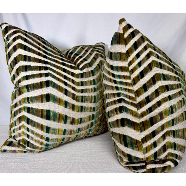 Custom pair of 22" pillows covered in Opuzen "Tazza" Velvet in color evergreen. These pillows have tapered corners to...