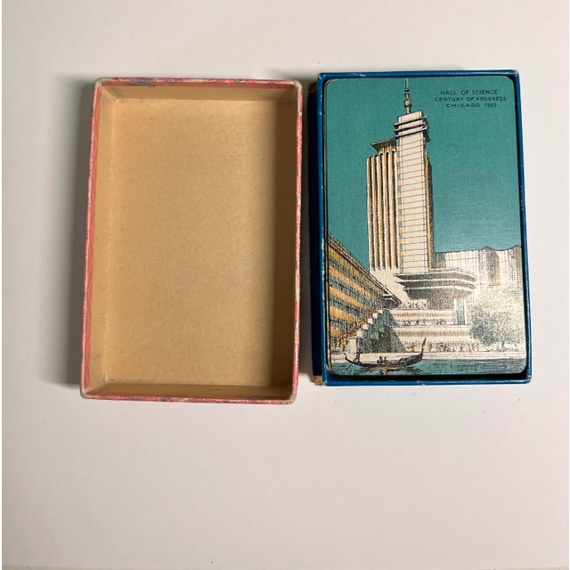 Set of playing cards from 1933 Chicago World's Fair Hall of Science. One joker with description card, 52 playing cards. In...
