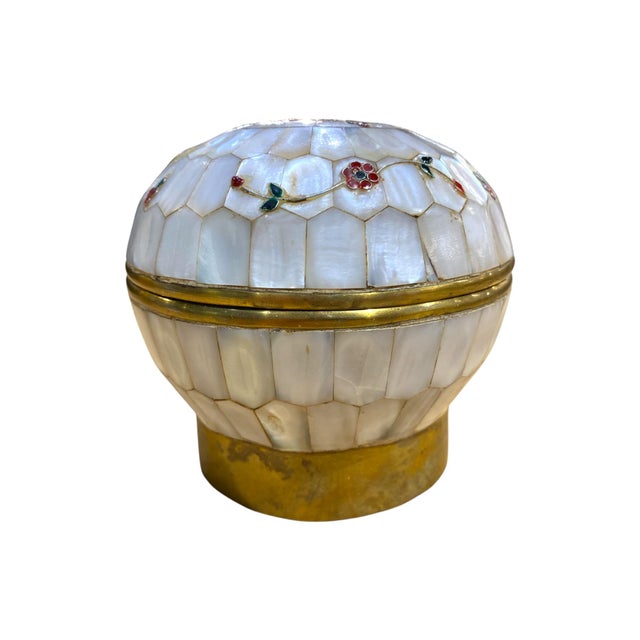 Beautiful mother-of-pearl and brass trinket box with floral inlay.