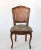 Beautiful vintage side chair with floral upholstered seat and double caned back rest. Made in Italy. Makers mark on the...
