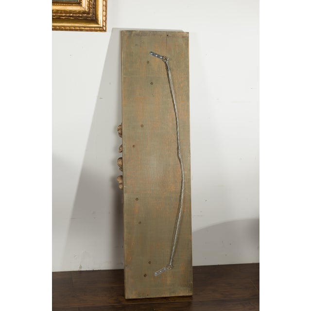 An English carved wooden fragment from the 19th century, with fruits and flowers garland. Created in England during the...