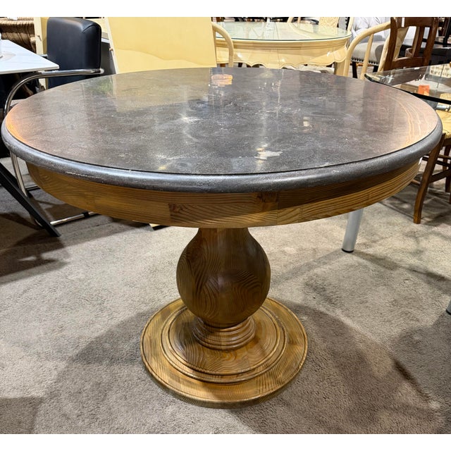 Bring timeless European charm into your dining space with the Arhaus “Luca” French Country Style Dining Table, a...