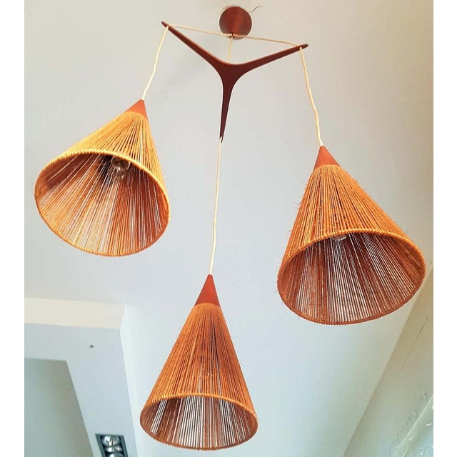 Pendant light with triple shade of teak and natural ropes of IB Fabiansen for Fog & Mørup, Denmark in the 1960s. Danish...