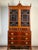 A handsome **Federal period flame mahogany secretary bookcase dating to circa 1810–1825**, combining impressive...