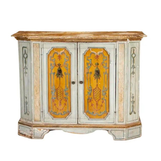 18th Century Italian Neoclassical Decorated Cabinet is hand-painted and features beautifully rendered neoclassical motifs-...