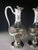 Superb pair of crystal ewers engraved with laurel branches Minerva silver (950) mounts, chased with garland decoration The...