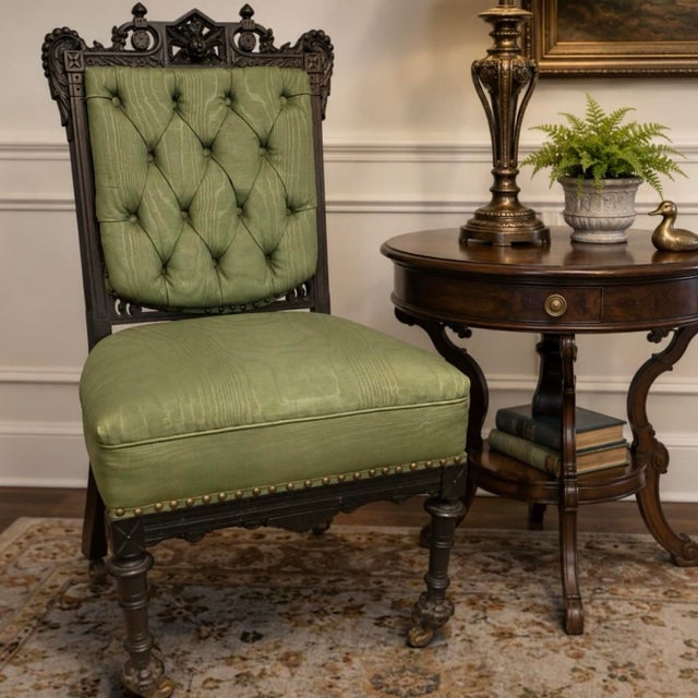 Striking late 19th-century Eastlake movement side chair featuring an ebonized wood frame and signature incised details....