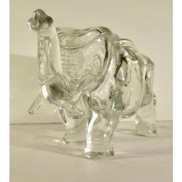 Elephant-shaped container. American decorative MCM glass. Also known as the good-luck elephant with its trunk up. Many...