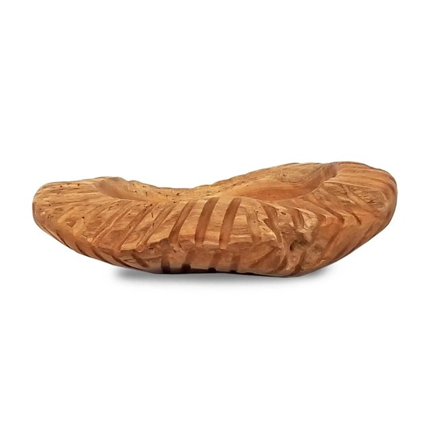 Handmade generously sized teak root bowl featuring a truly unique striped textured border. Each bowl is unique and wood...